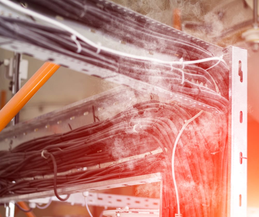 Short circuit of the wiring, the wiring of electric wires melts and smokes, fire and smoke, fastening, closeup electrical problems